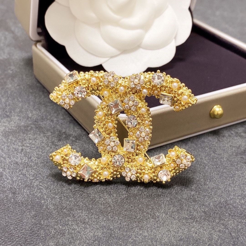 Ch**el brooches